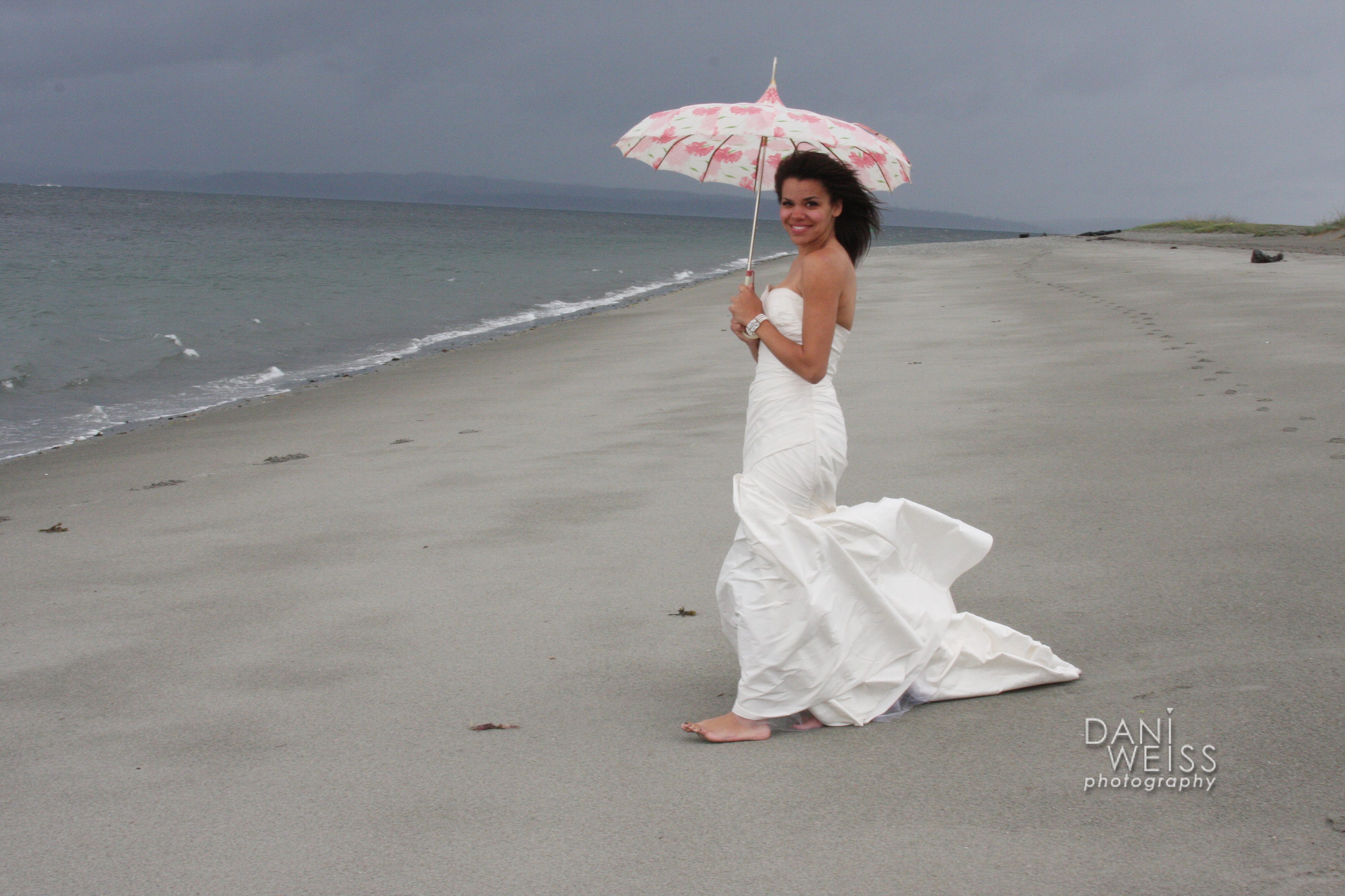 Bride on the Beach with an Umbrella